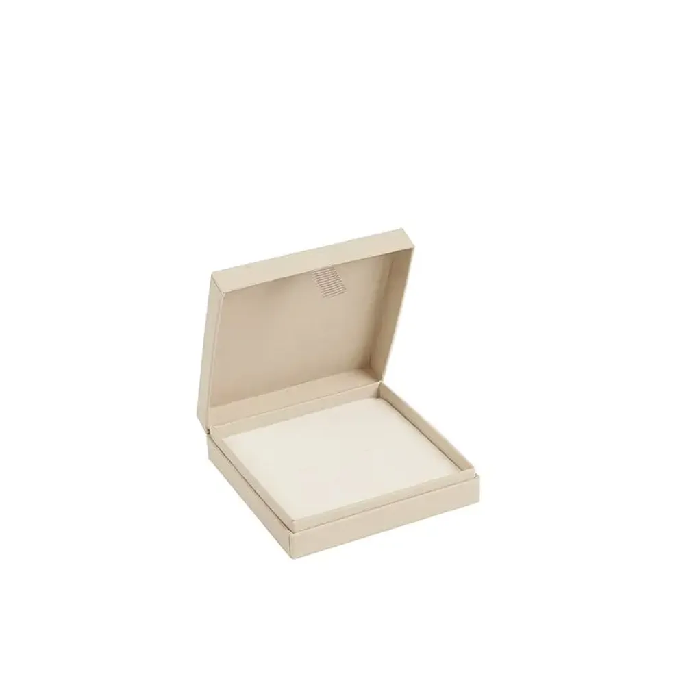 Cream-colored hinged cardboard storage box with a rubberized finish ...