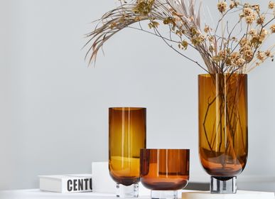 Vases - Sober modern glass vase, cylindrical shape on a solid base, amber or grey, OMAHA14 AM/GR - ELEMENT ACCESSORIES