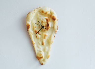 Clocks - NAAAAN time Flat : A clock made of real naan bread - YUKIKO MORITA
