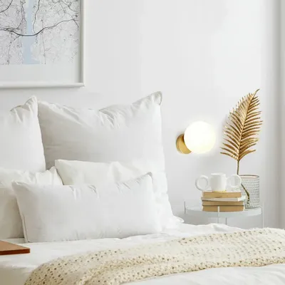 Wall lamps - LYMINGTON wall lamp with opalised globe and black/gold structure - LUXCAMBRA