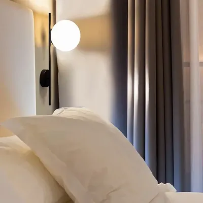 Wall lamps - LYMINGTON wall lamp with opalised globe and black/gold structure - LUXCAMBRA