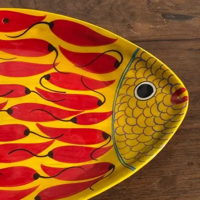 Platter and bowls - Decorative dish in the shape of a fish on a yellow background decorated with red peppers - OFFICE OBJETS