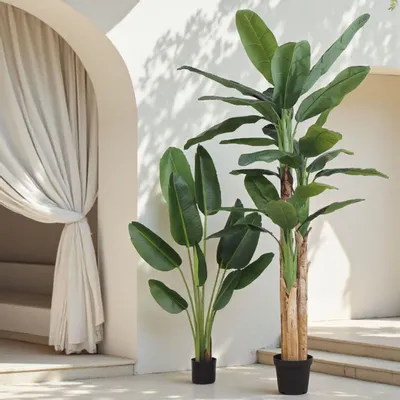 Floral decoration - Artificial banana tree, 27 leaves, black plastic pot - LIGNE DÉCO