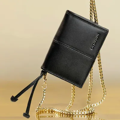 Objets design - Portefeuille en cuir véritable noir avec bandoulière en métal doré - OTTAVIANI