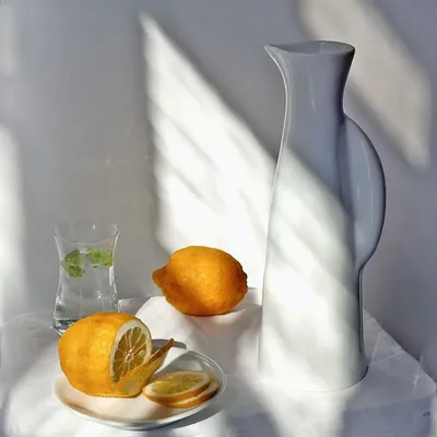 Vases - Like an attentive meerkat, the porcelain pitcher stands in quiet vigil - TSÉ & TSÉ
