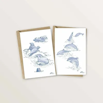 Carterie - 2 cartes postales dauphins et phoques - TABLE À CARTES