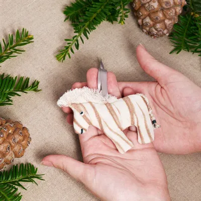 Christmas garlands and baubles - Dazzling Zebra Handcrafted Ornament - UNHCR/MADE51