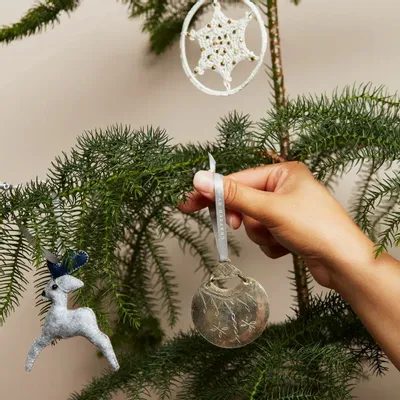 Christmas garlands and baubles - Handcrafted Desert Moon Christmas Ornament - UNHCR/MADE51