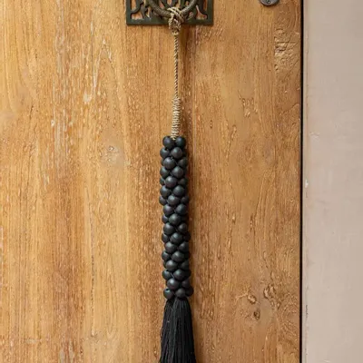 Objets de décoration - Les perles en bois avec pompon en coton - noires - BAZAR BIZAR LIVING