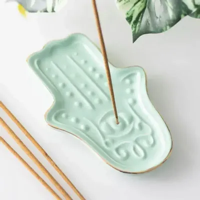 Senteurs - Porte-encens en forme de main de Hamsa bleue - SOMETHING DIFFERENT WHOLESALE EUROPE BV