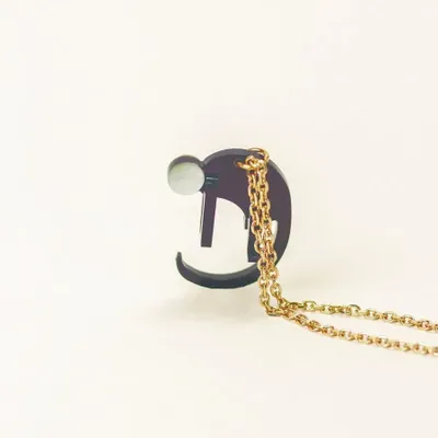 Bijoux - Pendentif Singe en corne noire et nacre - L INDOCHINEUR X RIVÊT