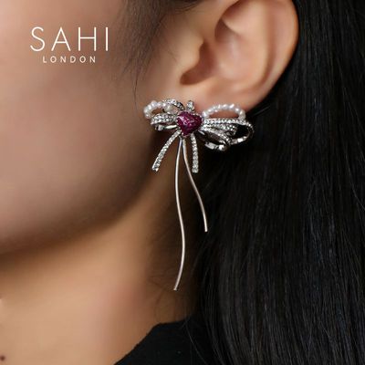 Jewelry - SAHI LOVE HEART ENAMELLED BOW PENDANT EARRINGS - SAHI LONDON