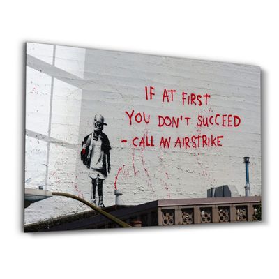 Other wall decoration - Banksy - Call an Airstrike | Glass Wall Art 110CMx70CM - ARTDESIGNA