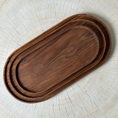 Platter and bowls - Trio of small oval trays or cups in monoxyl teak - OFFICE OBJETS