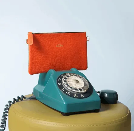 Clutches - JULIETTE  Two-tone leather pouch, adjustable into a mini bag 21×12,5cm - ATELIER BALTUS