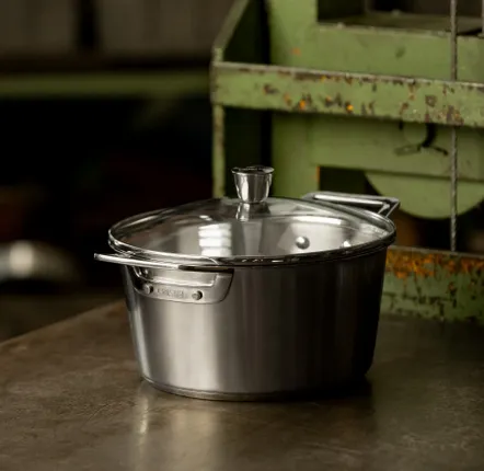 Faitouts - Faitout en inox brossé anses cuivrées avec couvercle BICENTENAIRE - CRISTEL