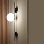 Wall lamps - LYMINGTON wall lamp with opalised globe and black/gold structure - LUXCAMBRA
