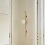 Wall lamps - LYMINGTON wall lamp with opalised globe and black/gold structure - LUXCAMBRA