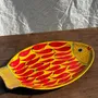 Platter and bowls - Decorative dish in the shape of a fish on a yellow background decorated with red peppers - OFFICE OBJETS