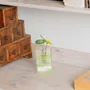 Vases - Small transparent 8x13 cm vase with applegreen-green stripes and with 3 small flowers - CARNEOL GLASS