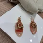 Bijoux - Boucles d'oreilles Cœur Solaire — Rouge Passion & Doré - LES TRÉSORS DE CIA