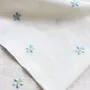 Table linen - Embroidered Linen Napkin | PRATOLINE Light Blue - GIARDINO SEGRETO