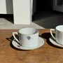 Decorative objects - Pair of white ADP France porcelain cups with floral pattern - OFFICE OBJETS