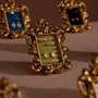 Objets de décoration - Cadre de présentation baroque doré pour bijoux - WHISPERING WOODS
