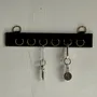 Decorative objects - Vintage wall key holder in black faux leather stitched with six rings - OFFICE OBJETS