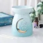 Objets de décoration - Brûle-parfum bleu à découpes de lunes - SOMETHING DIFFERENT WHOLESALE EUROPE BV