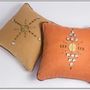 Fabric cushions - Zim.  Sand coloured linen and African beads.  - TISSERAND DAKAR