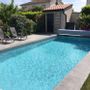Outdoor pools - L-shaped swimmingpool surround - ROUVIERE COLLECTION