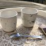 Mugs - Blue speckled white stoneware coffee cup - LES POTERIES DE SWANE
