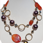 Bijoux - Collier enchaîné avec des agates colorées et des perles marron - L'OFFICIEL SRL