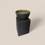 Decorative objects - NATURAL SCENTED CANDLE IN A BLACK STONEWARE PIEDESTAL - OUD WOOD - CLAIRE POUJOULA