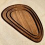 Platter and bowls - Trio of small rounded triangular-shaped trays or cups in monoxyl teak - OFFICE OBJETS