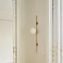 Wall lamps - LYMINGTON wall lamp with opalised globe and black/gold structure - LUXCAMBRA