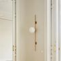 Wall lamps - LYMINGTON wall lamp with opalised globe and black/gold structure - LUXCAMBRA