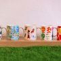 Tea and coffee accessories - Ceramic mugs illustrated with their gift box and gilding - CARTESDART