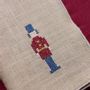Table linen - Linen napkin PUNTO CROCE | Nutcracker - GIARDINO SEGRETO