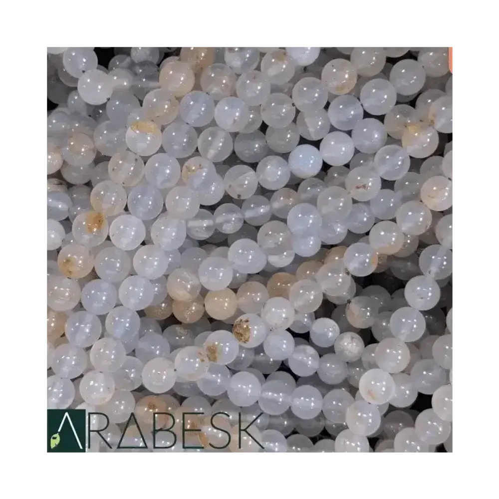 Bijoux - Calcédoine bleue A perles 8-9mm sur fil 40cm - ARABESK