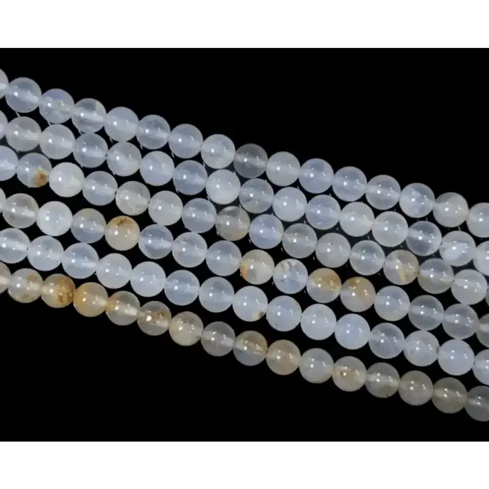 Bijoux - Calcédoine bleue A perles 8-9mm sur fil 40cm - ARABESK