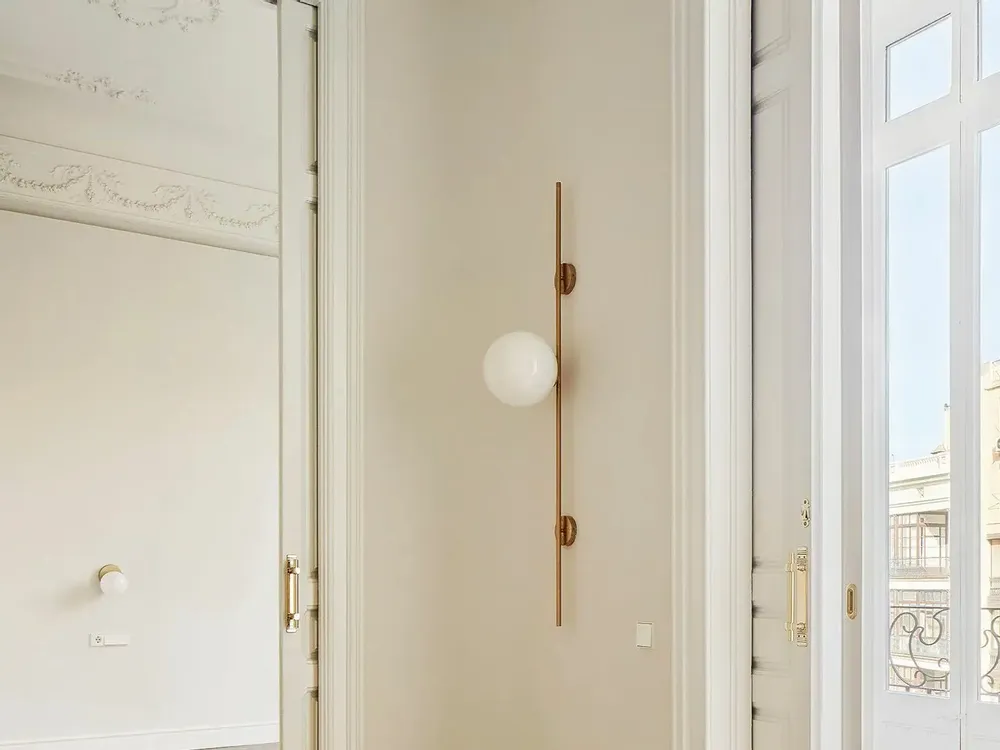 Wall lamps - LYMINGTON wall lamp with opalised globe and black/gold structure - LUXCAMBRA