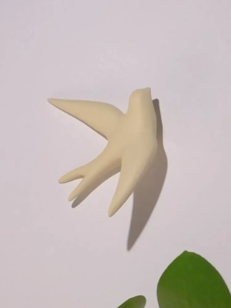 Outdoor decorative accessories - VOLAGE (Swallow) - Ephemerals - MONOCHROMIC CERAMIC