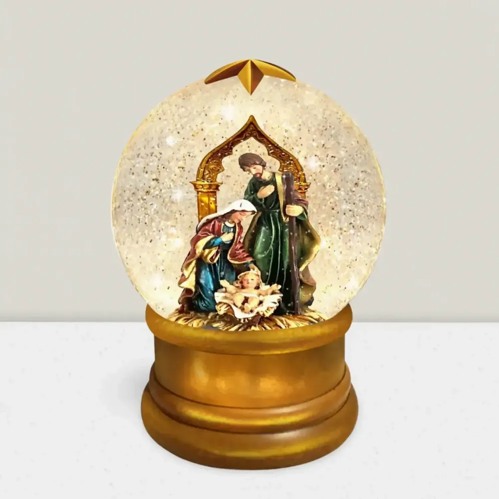 Crèches et santons - Boule à Neige LED avec Crèche – Sainte Famille, Paillettes et Lumière Chaleureuse - BLUE STAR B.V.