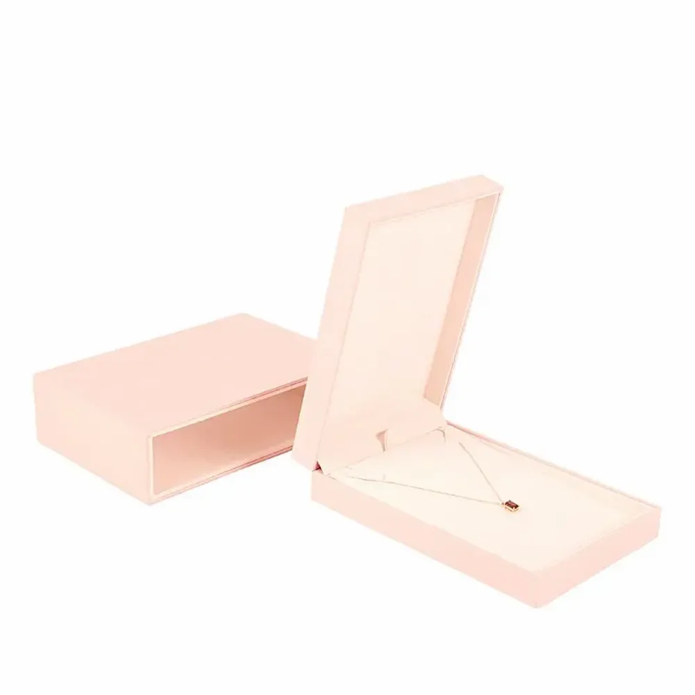 Gifts - Pale pink synthetic-coated, rubberized-look necklace case, matching pouch - LAVAL 1878