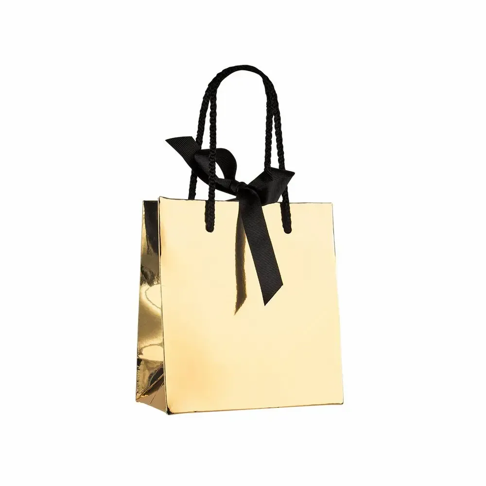 Gifts - Shiny paper bags with a golden mirror finish - LAVAL 1878