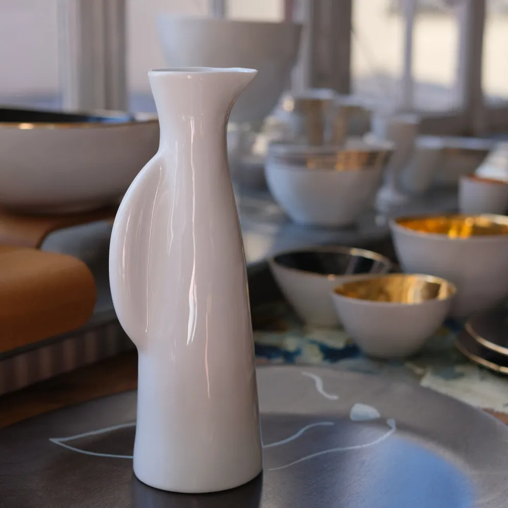 Vases - Like an attentive meerkat, the porcelain pitcher stands in quiet vigil - TSÉ & TSÉ