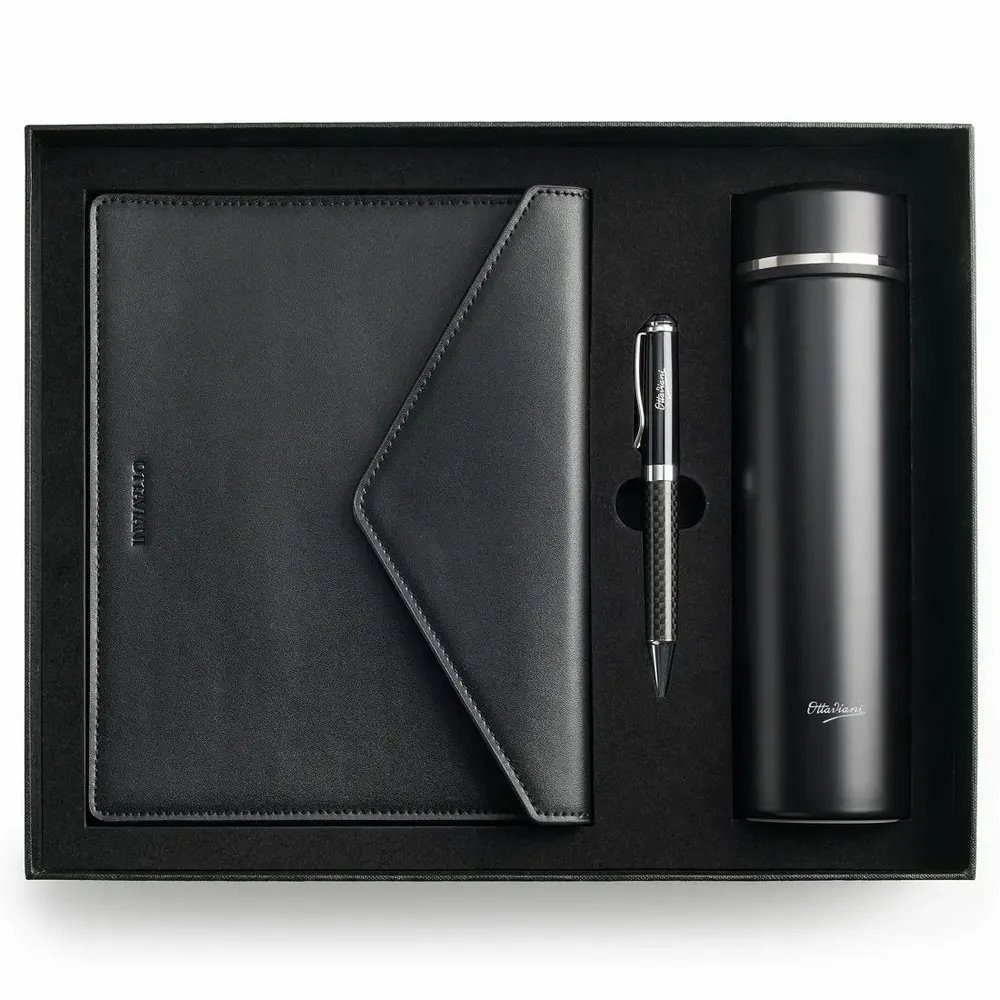 Objets design - Ensemble comprenant un stylo, une bouteille isotherme en acier inoxydable et un porte-documents en cuir véritable. - OTTAVIANI