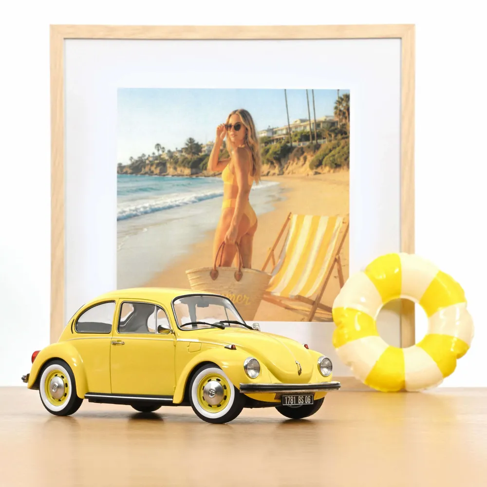 Cadeaux - Voiture miniature VW 1303 1973 Jaune pastel 1/18 - NOREV